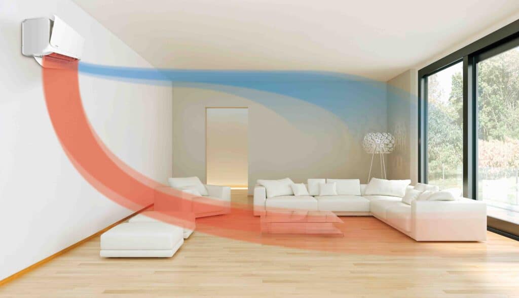 Air conditioning wall installation cooling down a living room inside a home